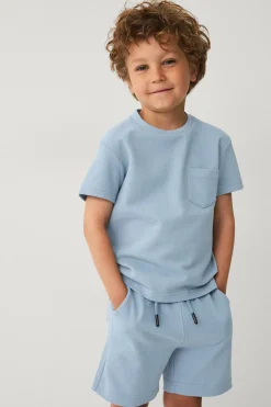 New Collection T-shirt + shorts i pikématerial Barnset